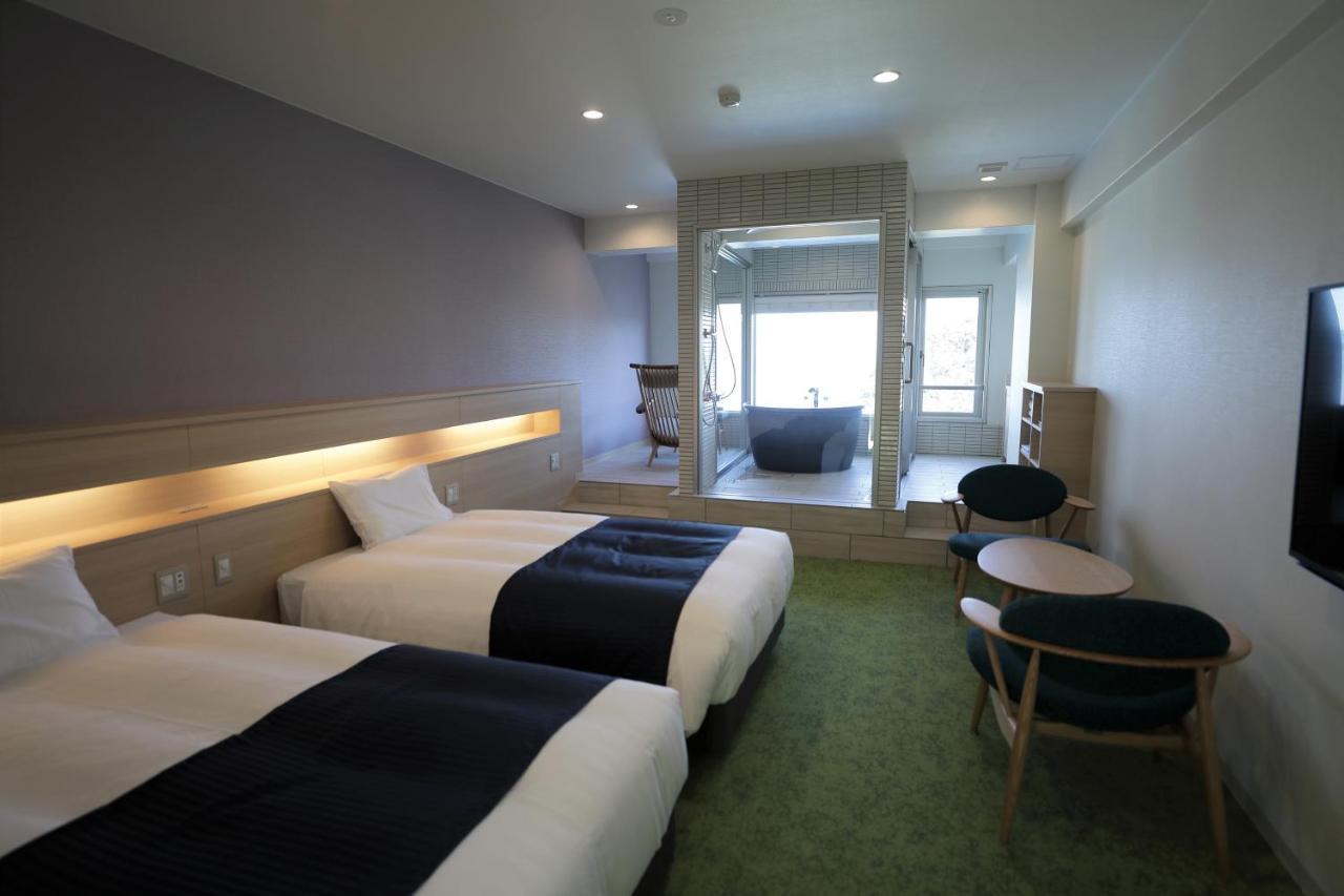 Hotel Izukyu Shizuoka Quarto foto
